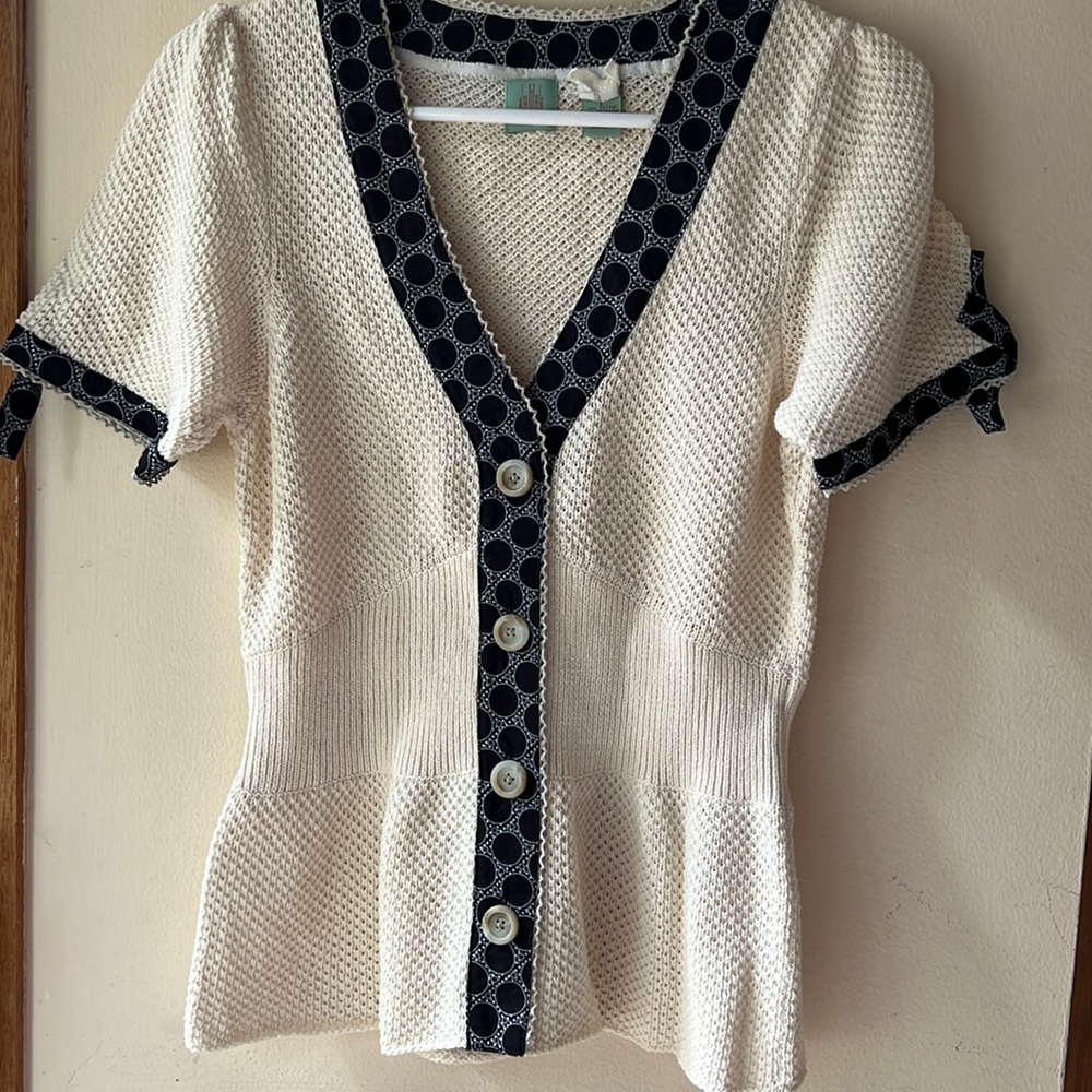 Cap sleeve buttoned knit top, brand new, in the original plastic bag, size L.